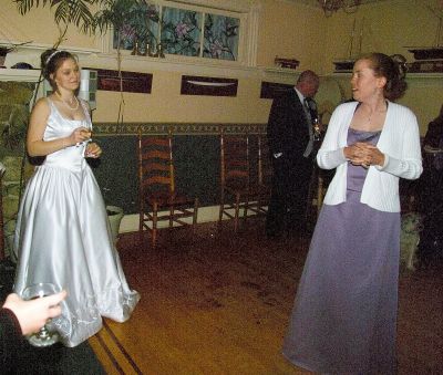 Bride and brides maid sharing thoughts without saying a word
Lisa and Lester Wedding St Juan Island 2004
Keywords: Lisa and Lester Wedding 2004